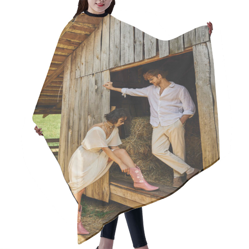 Personality  Stylish Asian Bride Wearing Pink Cowboy Boots Near Redhead Groom While Standing Near Wooden Barn Hair Cutting Cape