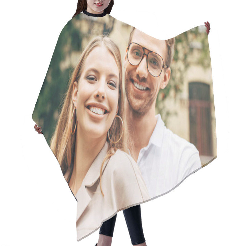 Personality  Close-up Portrait Of Smiling Young Couple In Stylish Clothes Looking At Camera Hair Cutting Cape