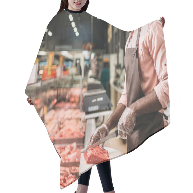 Personality  Cropped Image Of African American Male Shop Assistant In Apron Cutting Raw Meat In Grocery Store  Hair Cutting Cape