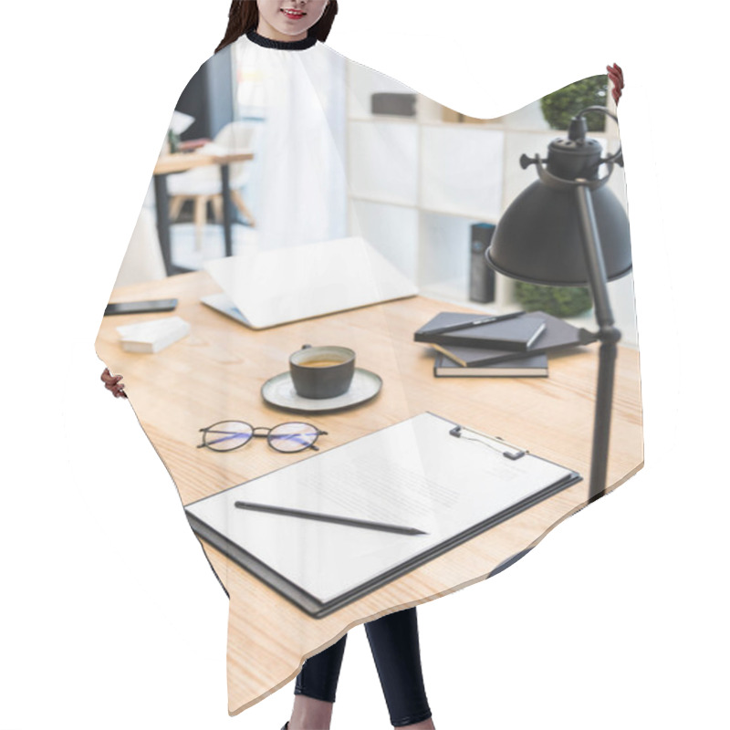 Personality  Close Up View Of Cup Of Coffee, Eyeglasses, Documents And Lamp At Workplace In Office Hair Cutting Cape