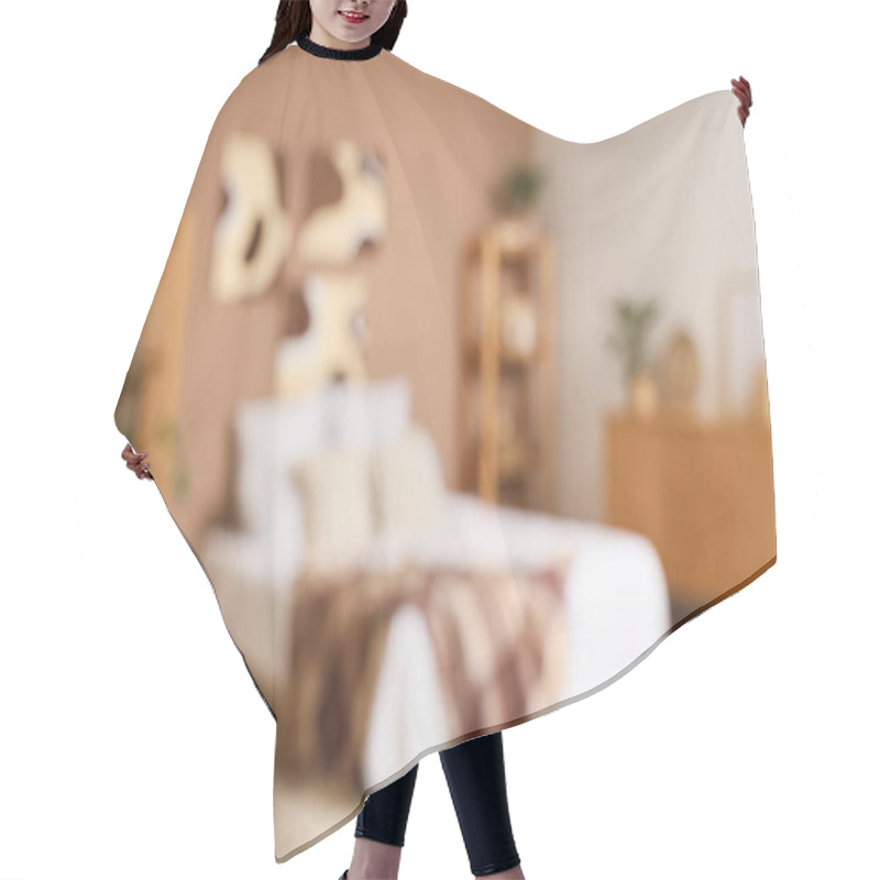 Personality  Blurred View Of Stylish Bedroom With Paintings Hair Cutting Cape