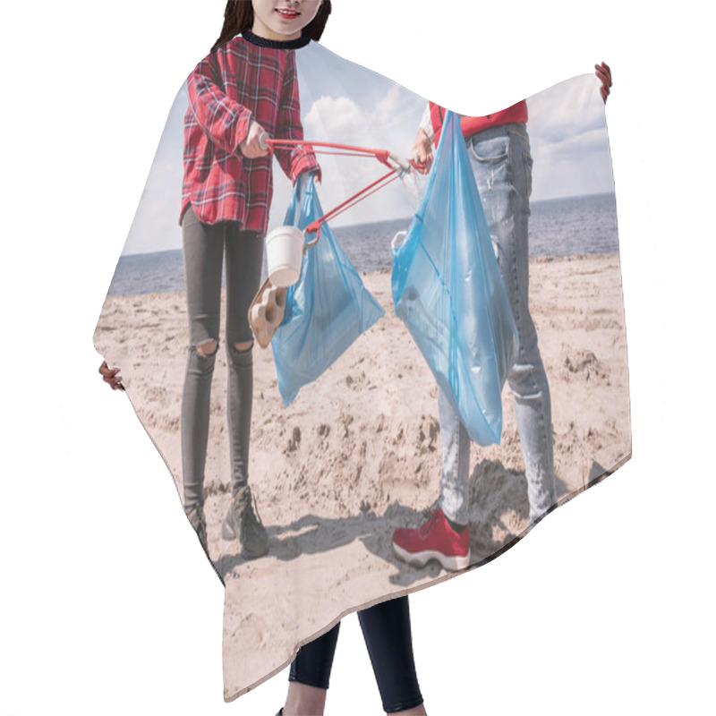 Personality  Cropped View Of Couple With Trash Bags And Grabbers Picking Up Garbage On Sand  Hair Cutting Cape