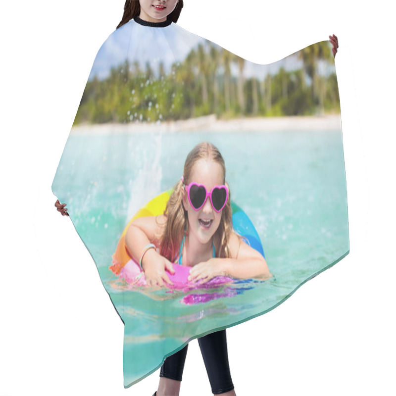 Personality  Child With Inflatable Ring On Beautiful Beach. Little Girl Swimming In Exotic Sea. Ocean Vacation With Kid. Children Play On Summer Beach. Water Fun. Kids Swim. Family Holiday On Tropical Island. Hair Cutting Cape