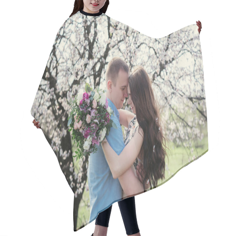 Personality  Young Couple In Love Outdoor On Blue Sky Background. Hair Cutting Cape