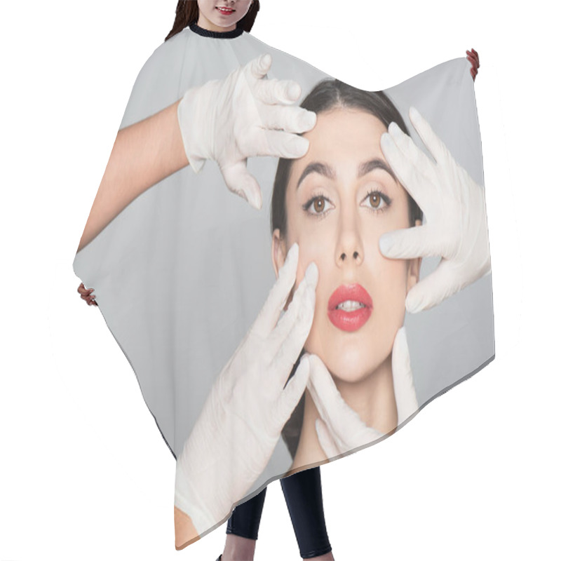 Personality  Plastic Surgeons In Latex Gloves Touching Face Of Brunette Woman Isolated On Grey Hair Cutting Cape