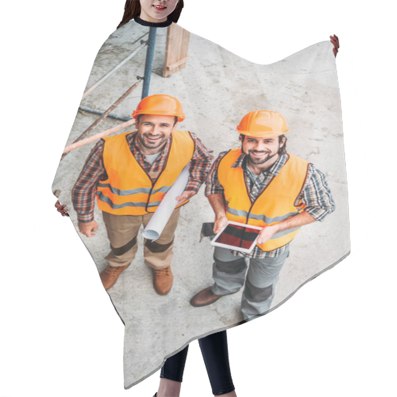 Personality  High Angle View Of Builders With Blueprint And Tablet Standing At Construction Site And Looking At Camera Hair Cutting Cape