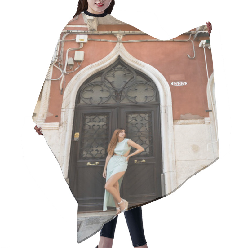 Personality  Full Length Of Elegant Woman Posing With Hand On Hip Near Medieval House In Venice Hair Cutting Cape