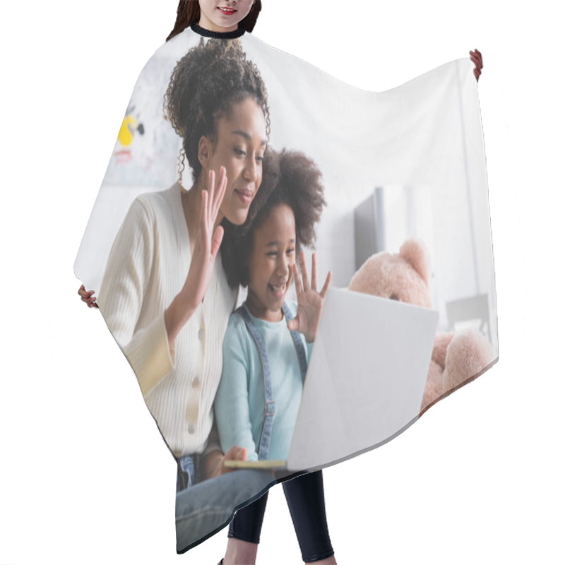 Personality  Smiling African American Mom And Child Waving Hands During Video Chat On Laptop Hair Cutting Cape