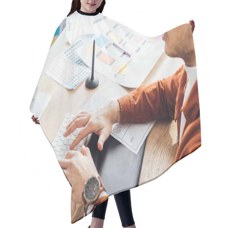 Personality  Cropped View Of Developer Using Computer Near Layouts Of Ux Design On Table  Hair Cutting Cape