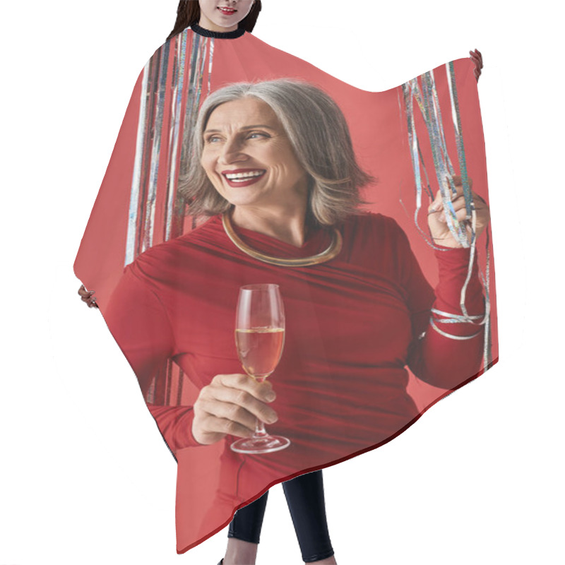 Personality  A Cheerful Mature Woman Raising A Glass, Enjoying The Festive Atmosphere Of Christmas And New Year. Hair Cutting Cape