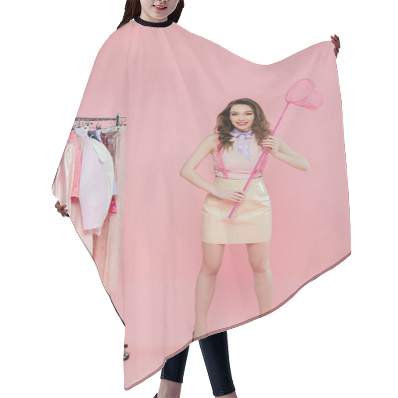 Personality  Fashion Concept, Happy And Young Woman Holding Net On Pink Background, Standing Near Rack With Clothes, Wardrobe Selection, Fashion And Trends, Doll-like Posing, Looking At Camera  Hair Cutting Cape