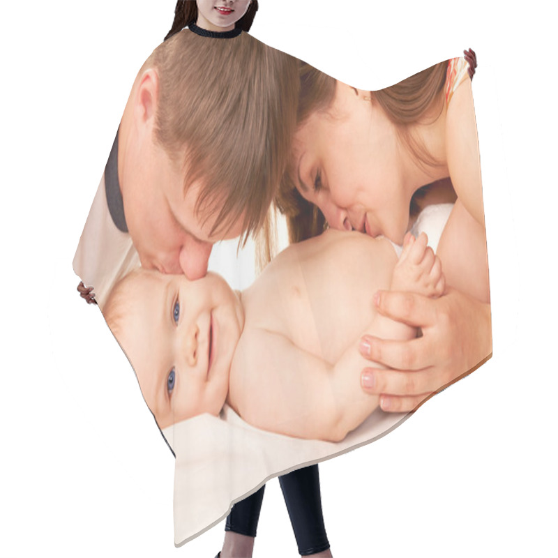 Personality  Happy Family Concept. Parents Kissing Baby Hair Cutting Cape