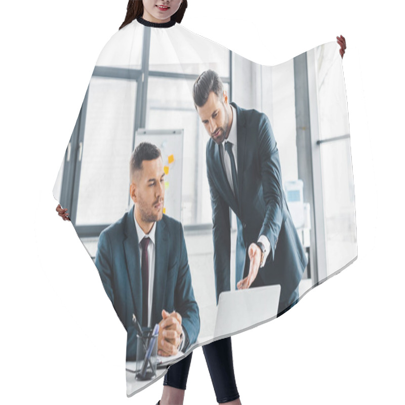 Personality  Handsome Businessman Showing Something On Laptop Near Coworker  Hair Cutting Cape