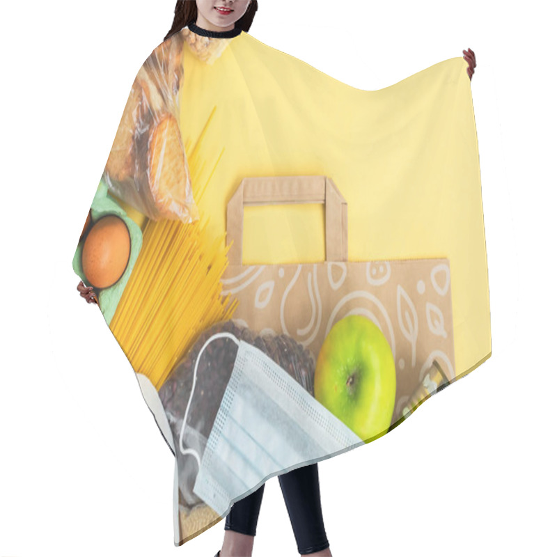 Personality  Food For Quarantine Isolation Period Flat Lay On Yellow Background With Copy Space. Eggs, Pasta, Beans, Toilet Paper, Apple And Some Seleals. Crisis Food Supplies. Delivery, Donation Concept. Hair Cutting Cape