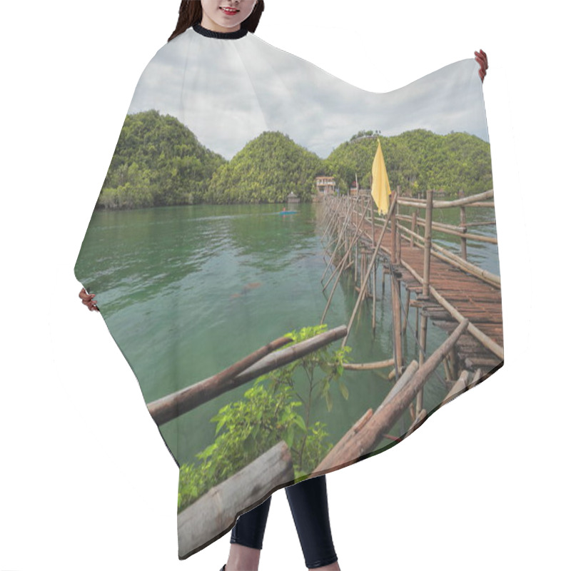 Personality  Bamboo And Wooden Planks Footbridge With Railings Of Tree Logs And Yellow-blue Flags Linking The Mainland And Latasan And Tinagong Dagat Islands. Sipalay-Negros Occidental-Western Visayas-Philippines. Hair Cutting Cape