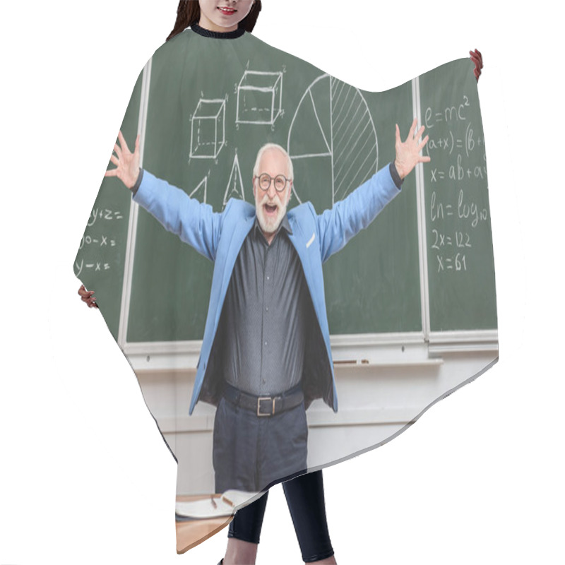 Personality  Happy Senior Lecturer With Open Arms Standing Near Blackboard Hair Cutting Cape