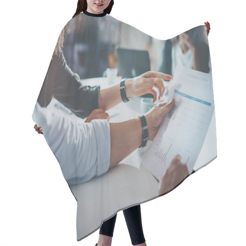 Personality  Young People Making Conversation With Partners At The Table.Man Holding Paper Document In Hand. Horizontal.Blurred Background. Hair Cutting Cape