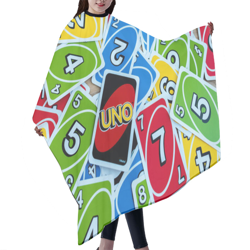 Personality  KYIV, UKRAINE - NOVEMBER 22, 2019: Top View Of Playing Card With Uno Letters Hair Cutting Cape