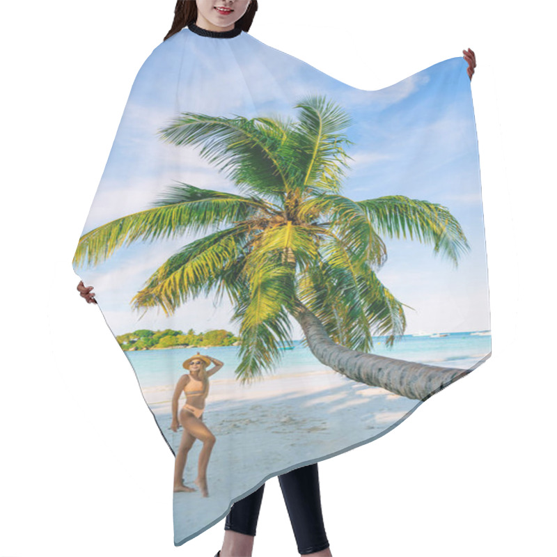 Personality  Woman Enjoys A Tropical Beach In Seychelles. Blue Sky And Sunny Day At Maldives Beach. Rear View Full Length Shot Hair Cutting Cape