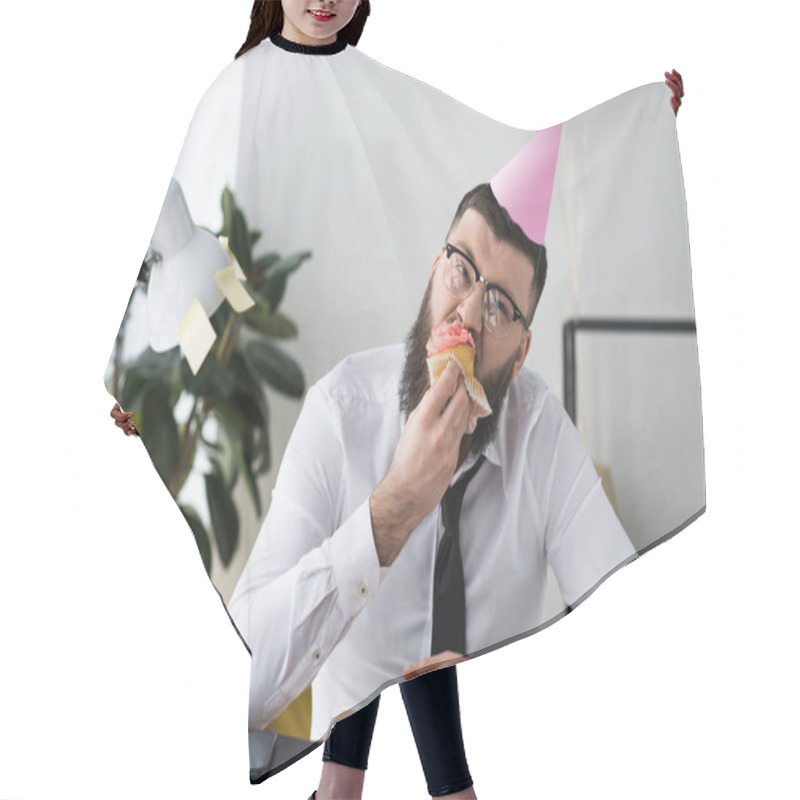 Personality  Portrait Of Businessman In Party Cone Eating Birthday Cupcake In Office Hair Cutting Cape