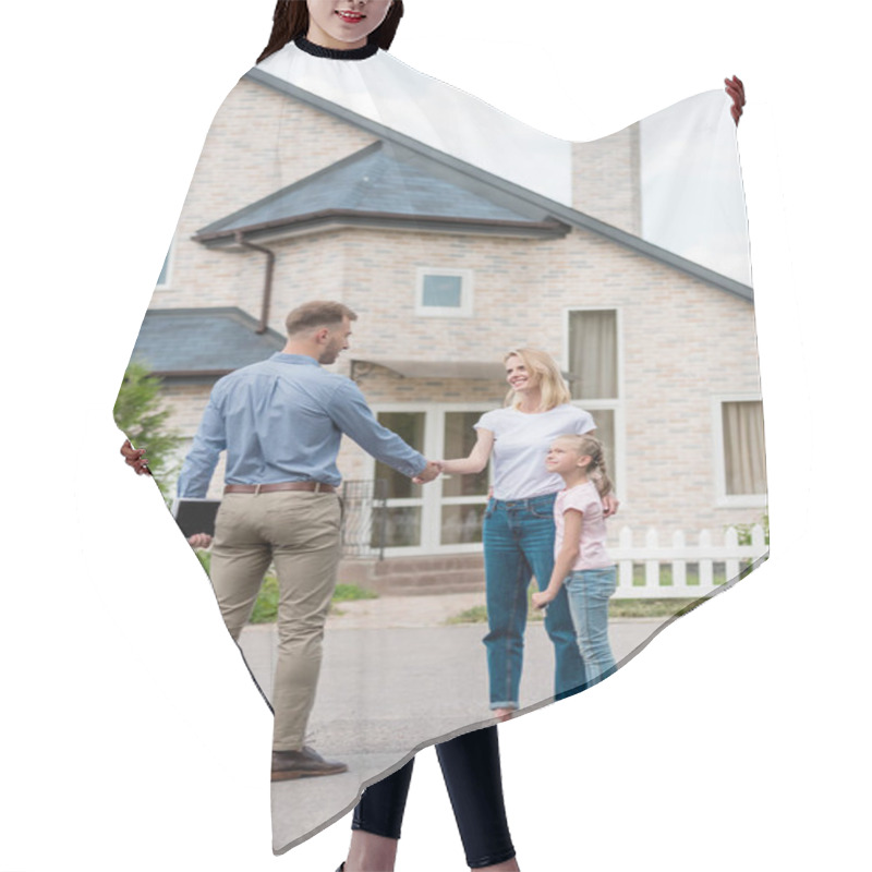 Personality  Realtor With Digital Tablet Shaking Hand Of Woman With Daughter In Front Of New Cottage  Hair Cutting Cape