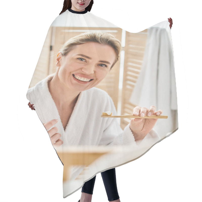 Personality  Appealing Cheerful Woman In Bathrobe With Blonde Hair Looking At Camera While Brushing Her Teeth Hair Cutting Cape