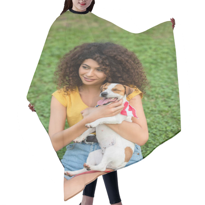 Personality  Selective Focus Of Young Woman Sitting On Grass With Dog And Looking Away Hair Cutting Cape