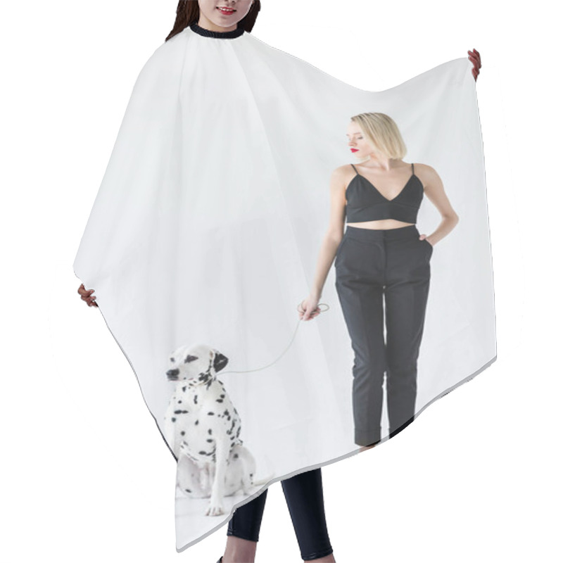 Personality  Attractive Stylish Blonde Woman In Black Clothes Holding Dalmatian Dog Leash On White Hair Cutting Cape