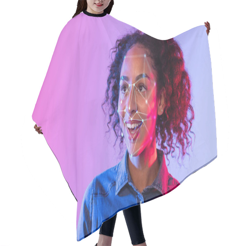 Personality  A Young African American Woman With Curly Hair Smiles As She Participates In A Facial Recognition Technology Demonstration, Illuminated By Colorful Lights In The Background. Hair Cutting Cape