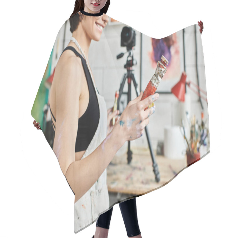 Personality  Woman Holding A Bottle Of Paint In A Vibrant Studio. Hair Cutting Cape