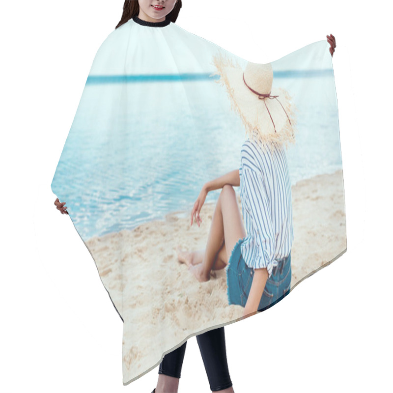 Personality  Rear View Of Young Woman In Straw Hat Relaxing On Sandy Beach  Hair Cutting Cape