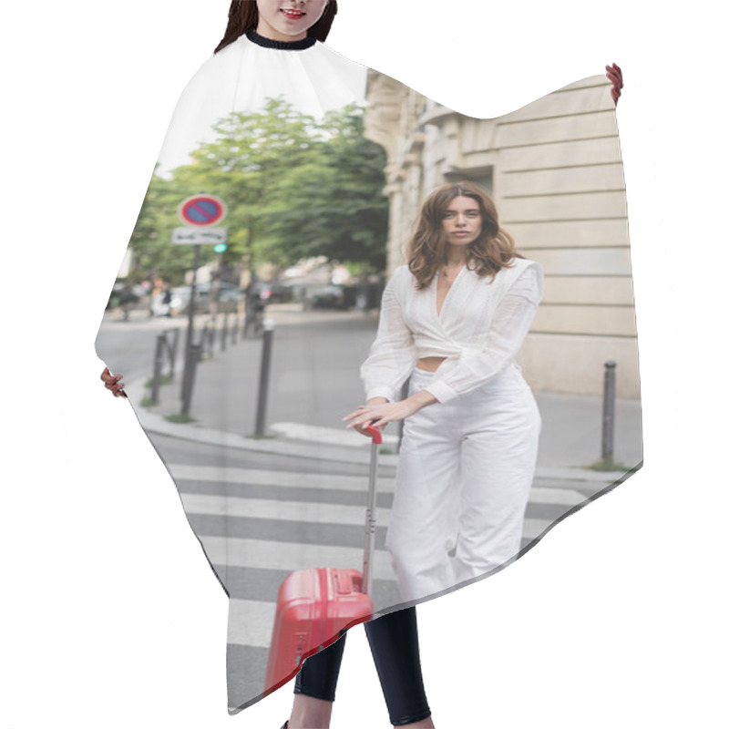 Personality  Stylish Brunette Woman With Suitcase Looking At Camera On Crosswalk In Paris  Hair Cutting Cape