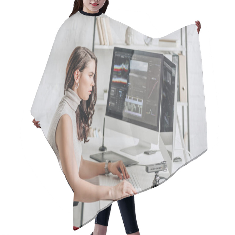 Personality  Side View Of Attractive Art Editor Working Near Computer Monitors  Hair Cutting Cape