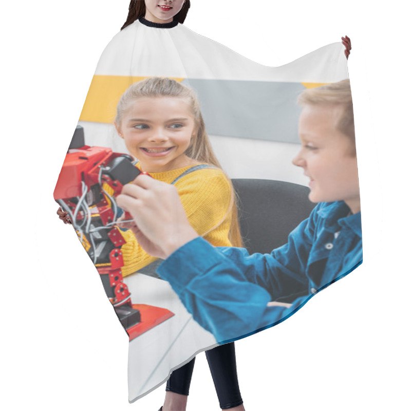 Personality  Smiling Schoolchildren Programming Robot Together During STEM Educational Class Hair Cutting Cape