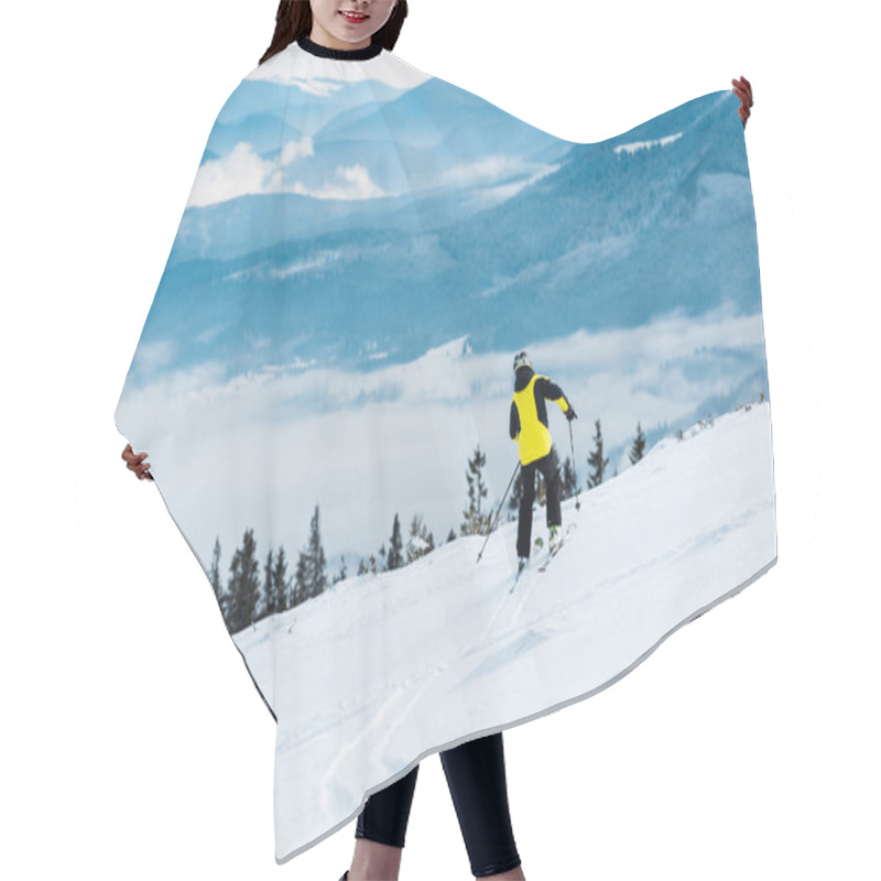 Personality  Sportsman In Helmet Skiing On Slope Near Mountains  Hair Cutting Cape