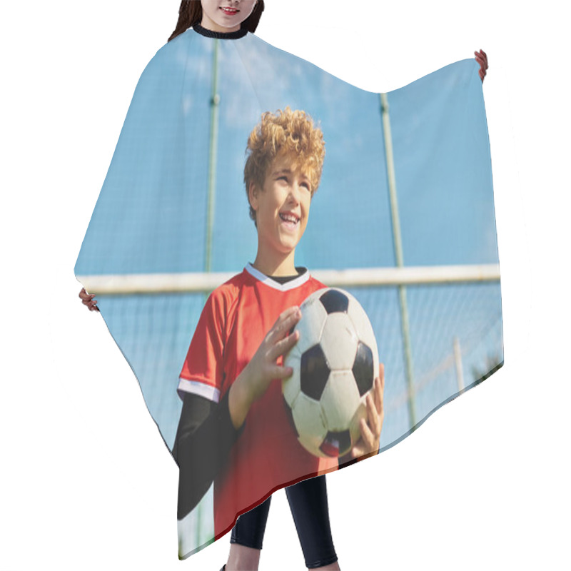 Personality  A Young Boy Stands In Front Of A Soccer Goal, Holding A Soccer Ball With A Determined Expression. He Is Positioned For A Kick, Showcasing His Love For The Sport And His Readiness To Score A Goal. Hair Cutting Cape