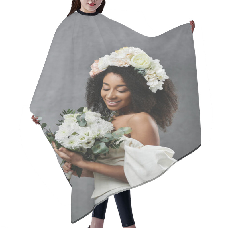 Personality  A Beautiful African American Bride In A White Wedding Dress With A Floral Crown And Bouquet. Hair Cutting Cape