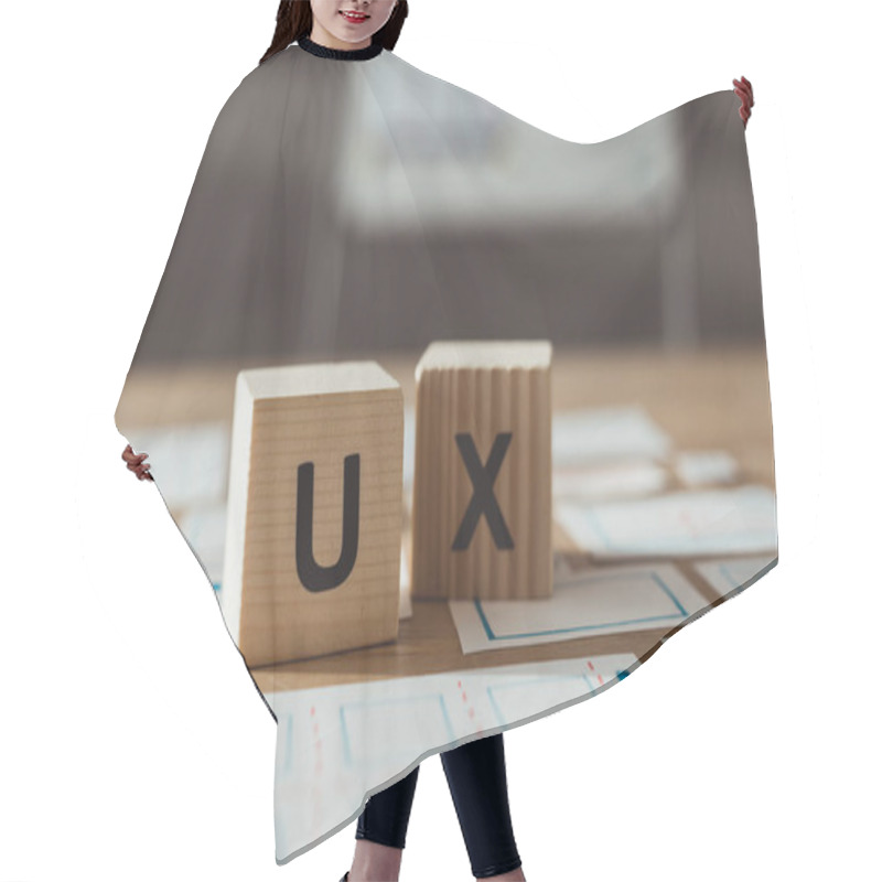 Personality  Selective Focus Of Cubes With Ux Letters And Designer App Sketches On Table Hair Cutting Cape