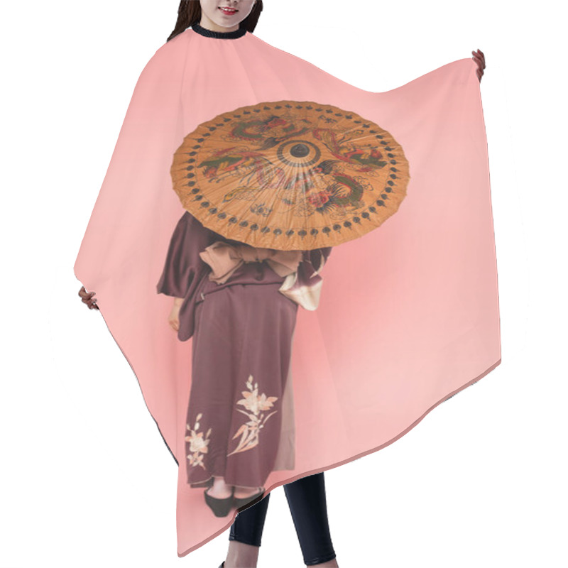 Personality  Back View Of Asian Woman Holding Traditional Umbrella On Pink Background Hair Cutting Cape