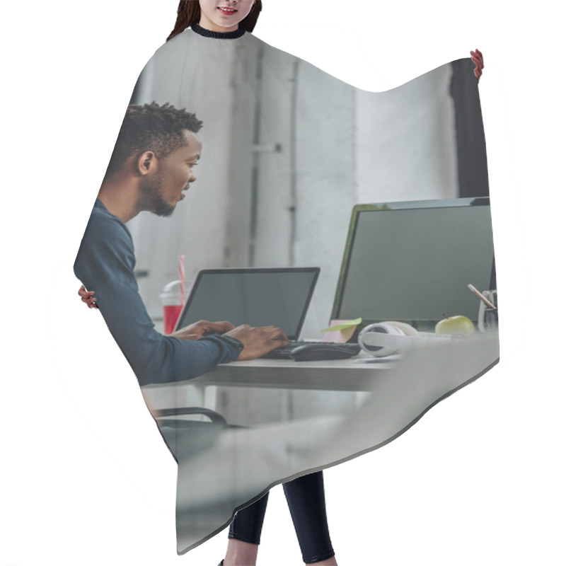 Personality  Young African American Programmer Working In Office Near Colleague Hair Cutting Cape