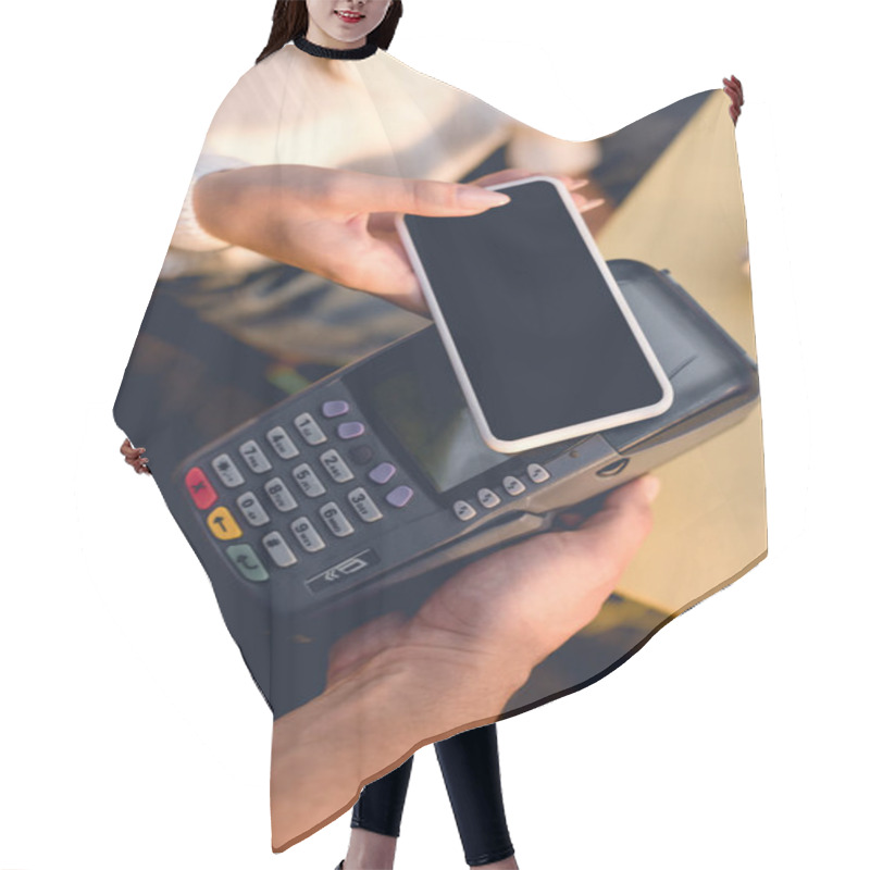 Personality  Top View Of Young Woman Paying With Smartphone In Cafe  Hair Cutting Cape