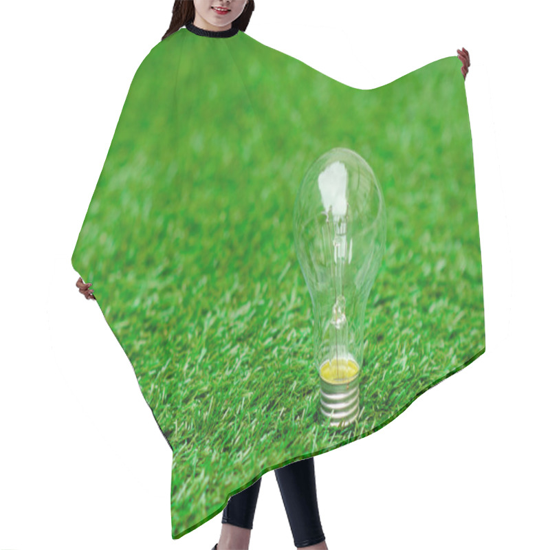 Personality  Light Bulb Lying On Green Grass Hair Cutting Cape