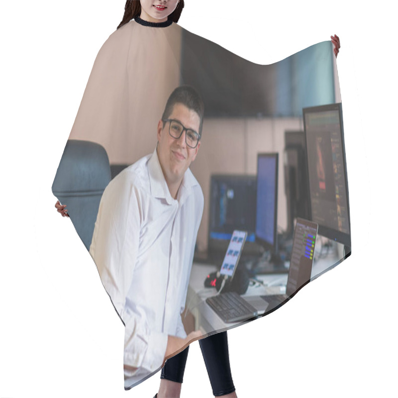 Personality  A Programmer Diligently Testing Smartphone Applications While Sitting In Their Office. High Quality Photo Hair Cutting Cape