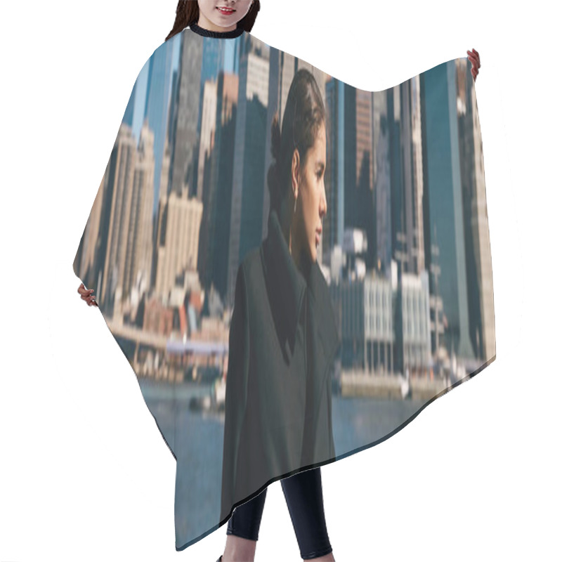 Personality  A Young Woman Stands On A Waterfront In New York City, Gazing Out At The Cityscape. Hair Cutting Cape