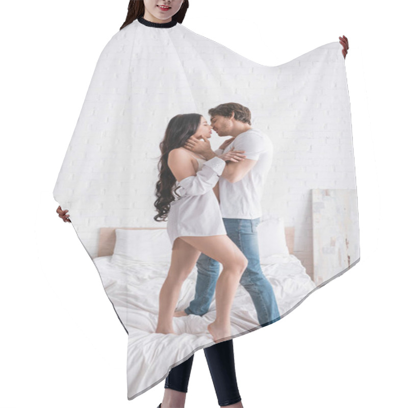 Personality  Side View Of Sexy Young Couple Embracing And Kissing While Standing On Bed Hair Cutting Cape