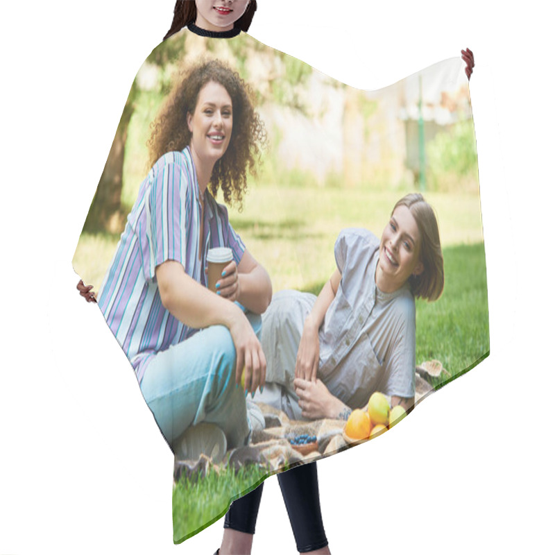 Personality  Two Friends Relax On A Blanket Outdoors, Sharing Smiles And Enjoying Delicious Snacks Together. Hair Cutting Cape