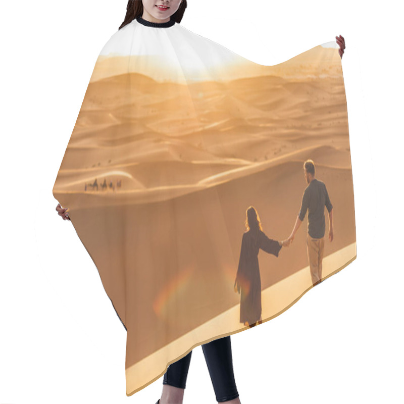 Personality  Couple Walking In Sahara Desert At Sunset. View From Behind, Nature Background. Travel, Freedom And Wanderlust Concept. Hair Cutting Cape