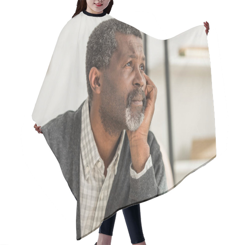 Personality  Depressed, Senior African American Man Holding Hand Near Face And Looking Away Hair Cutting Cape