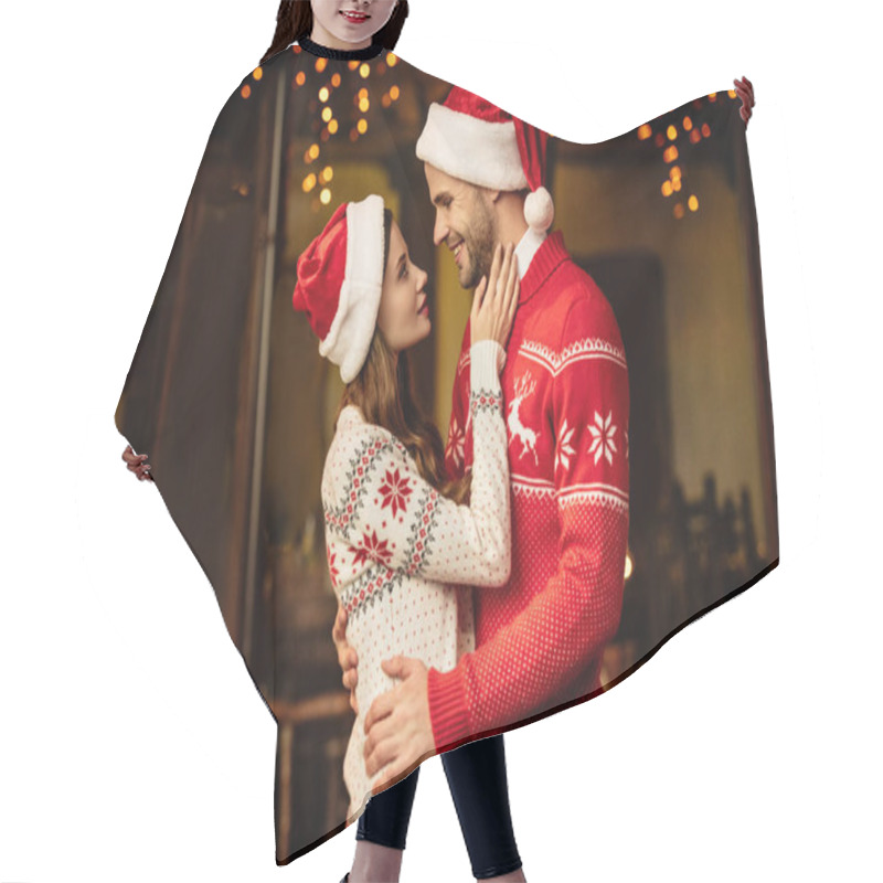 Personality  Happy Young Couple In Santa Hats And Warm Sweaters Embracing While Looking At Each Other Hair Cutting Cape