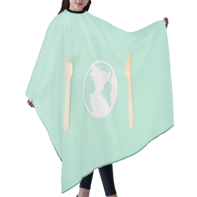 Personality  Top View Of Wooden Cutlery And Papers Planet Sign On Green Background, Ecology Concept Hair Cutting Cape